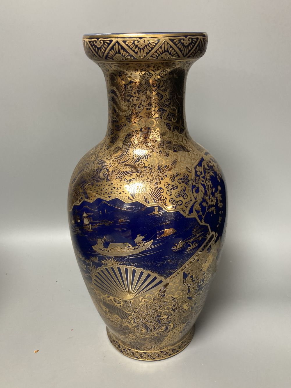 A Japanese satsuma vase, a tea cup and saucer and another vase, tallest 37cm